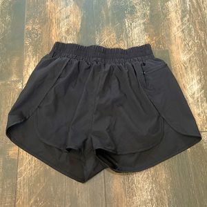 Black 2 inch inseam running shorts size medium.